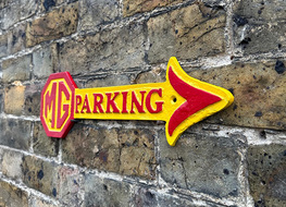 MG parking arrow plaque